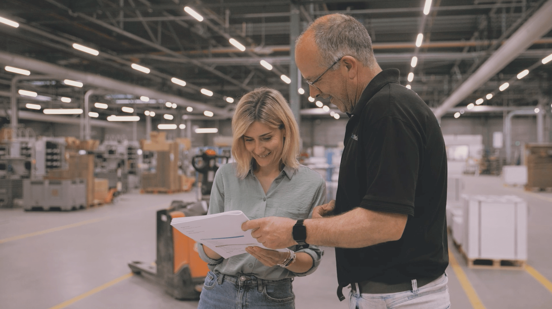 Control Media Employees Reviewing Materials
