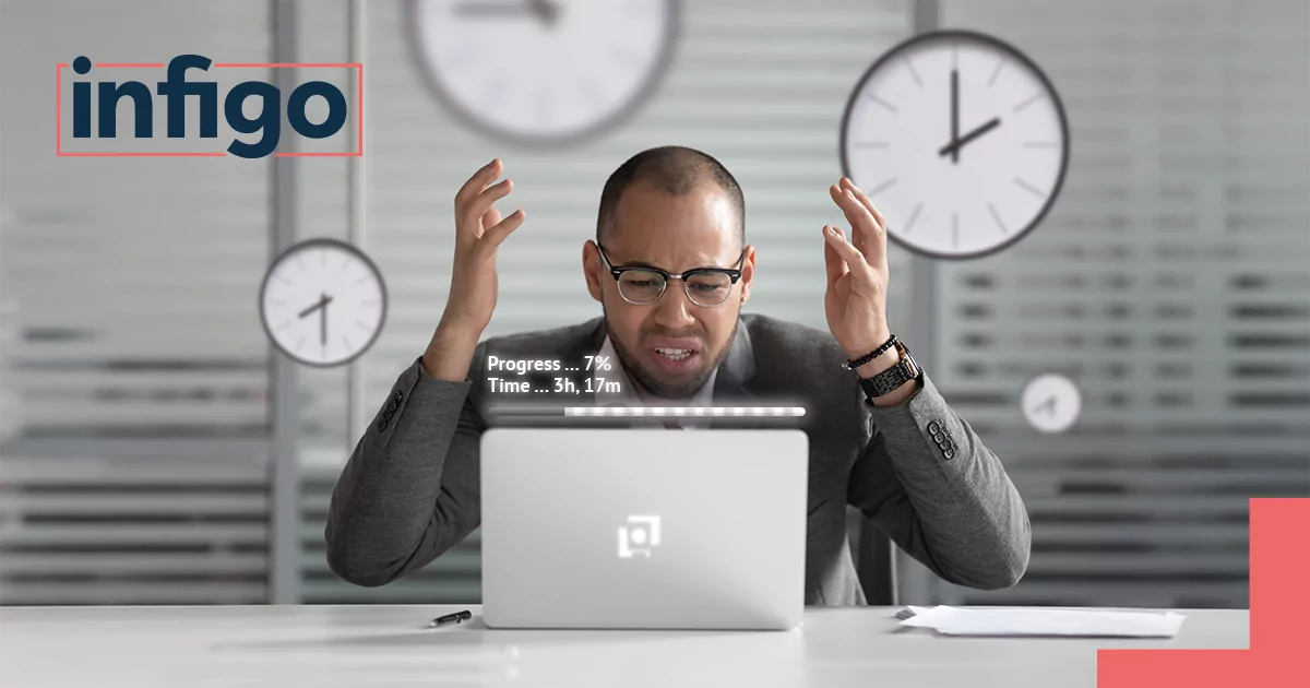 Man Frustrated at Computer with Slow Progress Bar