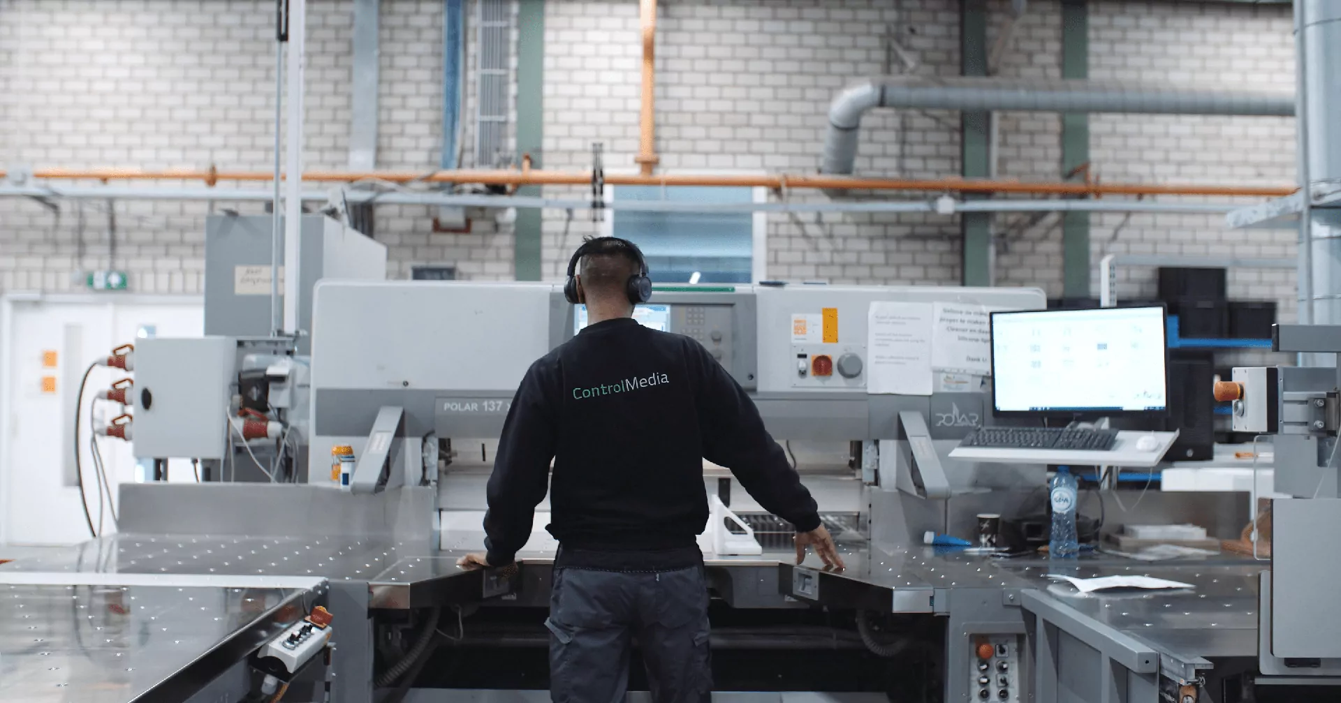 Control Media Employee with Machinery