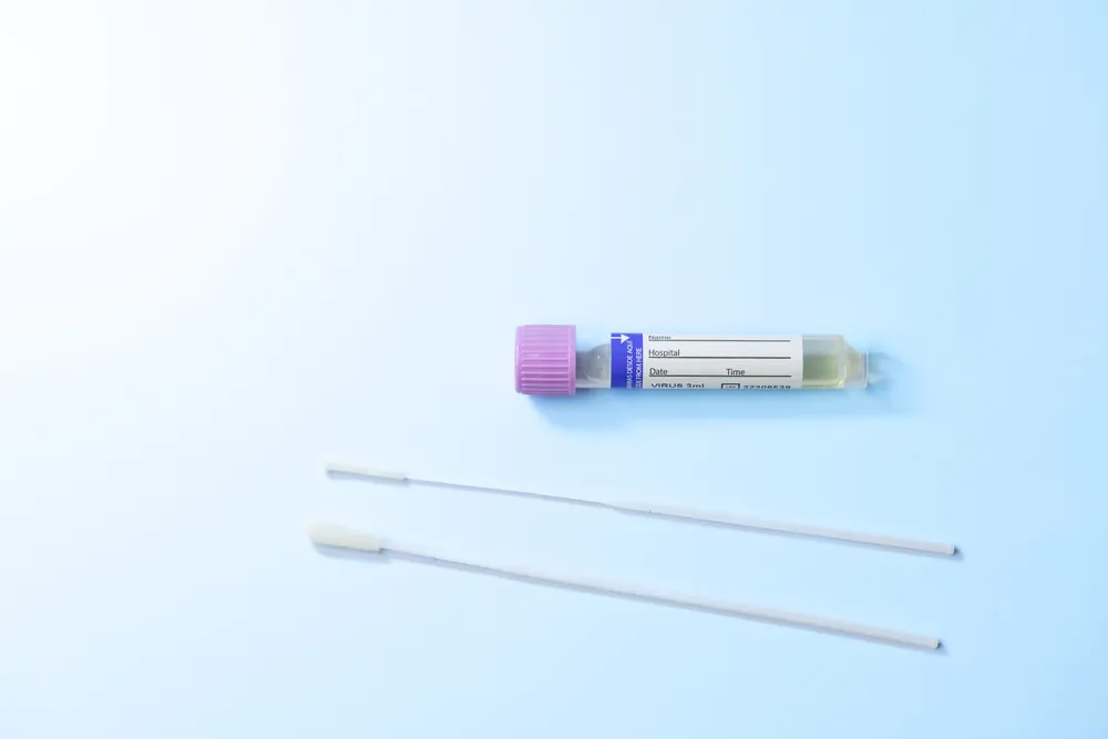 A healthcare test kit on a light blue background